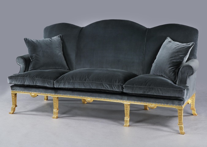 A Queen Anne style giltwood sofa in the manner of Lenygon & Morant Mackinnon Fine Furniture Collection