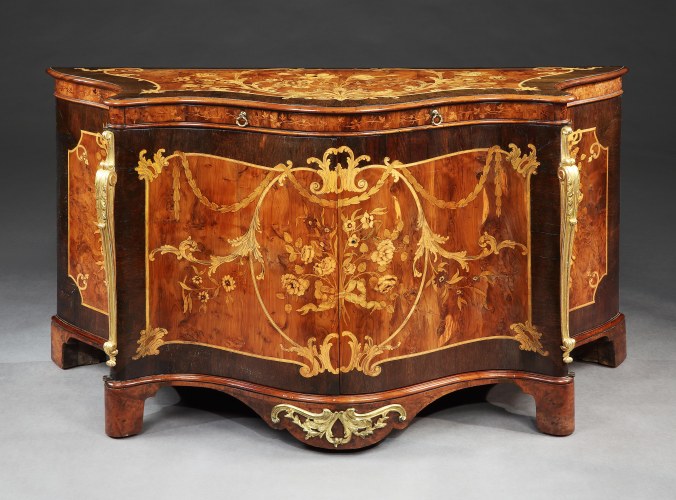 A George III Marquetry Commode A Pair of George III Giltwood Armchairs attributed to Mayhew & Ince Mackinnon Fine Furniture Collection